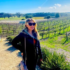 Beautiful black jacket with faux fur. Water proof. Only warm once! Size small.